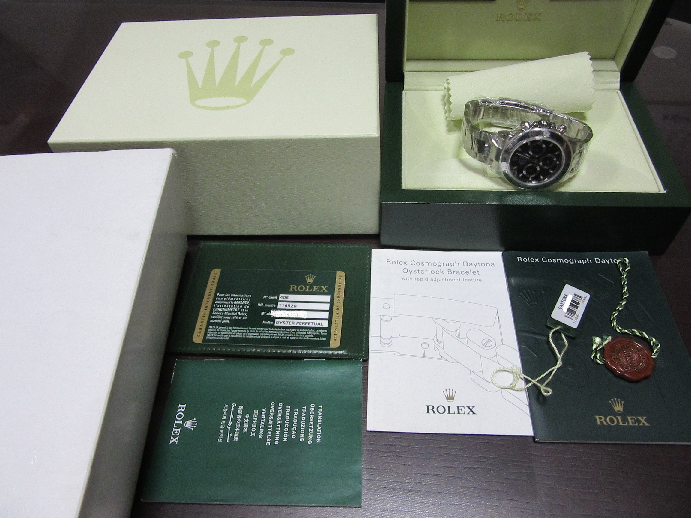 ロレックス ROLEX ”デイトナ 未使用シール付” Ref-116520 ランダムシリアル ディスコン品 ブラック文字盤 ギャランティ・タグ